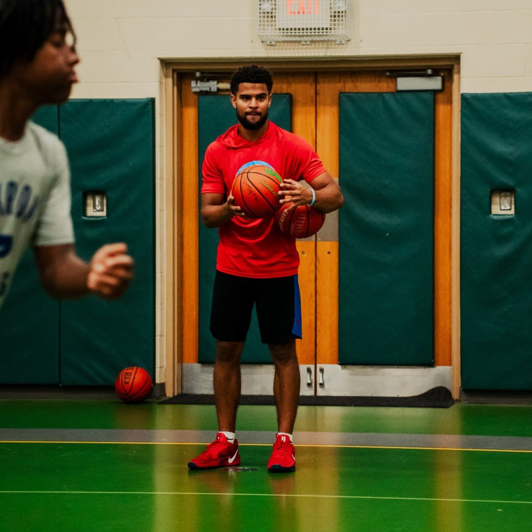 Chase Toppin leading a basketball drill at LCTB